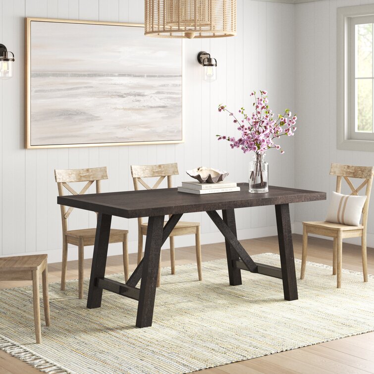 Dark wood dining table with outlet bench